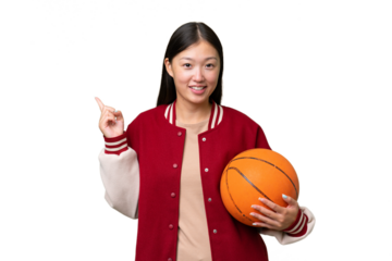 Young basketball player asian woman over isolated background pointing finger to the side