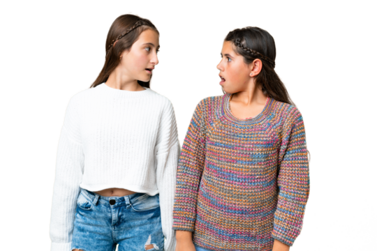 Friends girls over isolated chroma key background with surprise facial expression