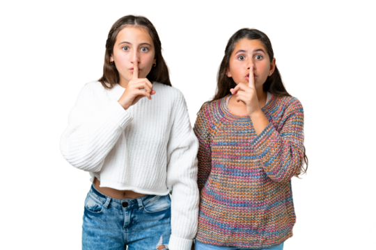 Friends girls over isolated chroma key background showing a sign of closing mouth and silence gesture
