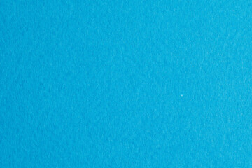 Fototapeta na wymiar Rough kraft paper pieces background, geometric monochrome paper texture sky blue color. Mockup with copy space for text