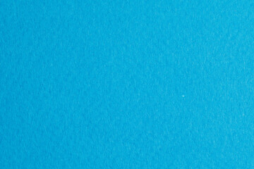 Obraz premium Rough kraft paper pieces background, geometric monochrome paper texture sky blue color. Mockup with copy space for text