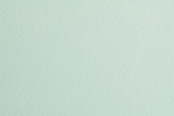 Rough kraft paper background, monochrome paper texture mint color. Mockup with copy space for text