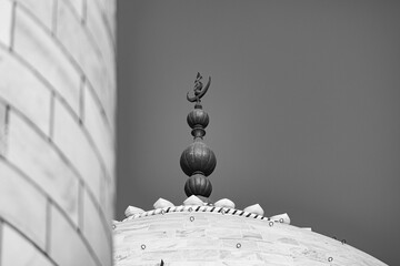 Finial at the top of the Taj Mahal black & white - Powered by Adobe