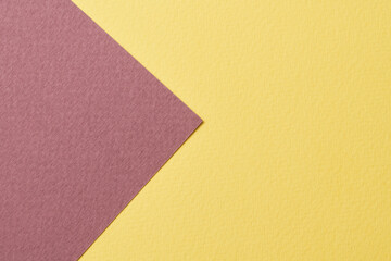 Rough kraft paper background, paper texture burgundy yellow colors. Mockup with copy space for text