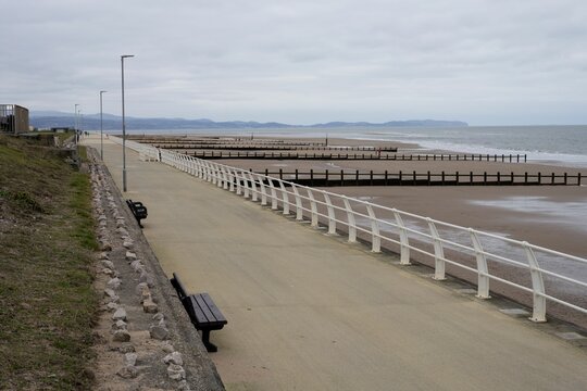 looking along the empty seaside promenade Rhyl North Wales UK