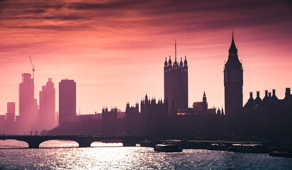 Big Ben, Westminster and House of Lords at the sunset.