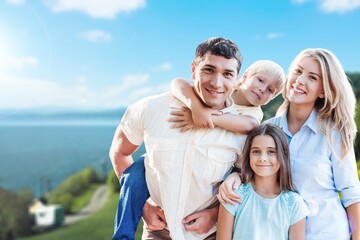 Happy young family have fun in the garden