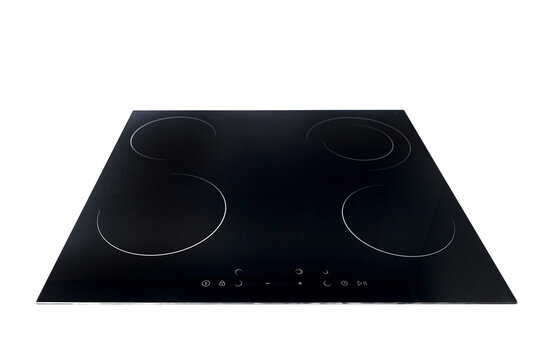 Flat cooktop cooking induction electric built black stove. Electric induction hob with ceramic tempered glass surface with white burners and touch control buttons panel isolated on white.
