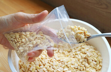 Keep Soybeans Mixed with Tempeh Starter in Perforated Zip-top-bags for Fermentation in a Warm Place