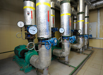 Complex system of pumps , manometers, pipelines, faucets and valves. Production hall of the biggest...
