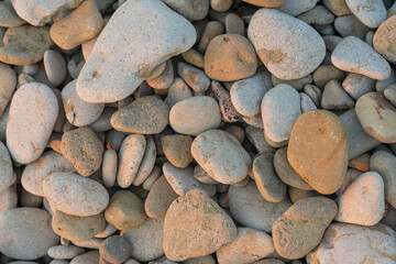 Pebble beach. Stone pebbles close-up. Stone background.