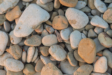 Pebble beach. Stone pebbles close-up. Stone background.