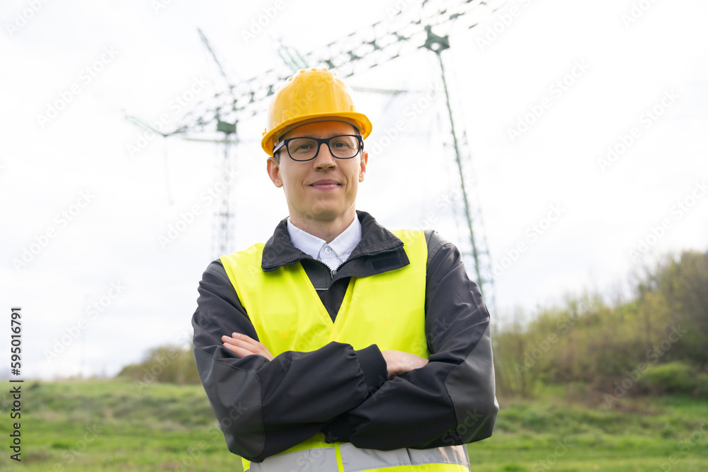 Poster engineer on a background of power line tower