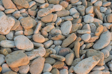 Pebble beach. Stone pebbles. Stone background.