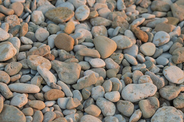 Pebble beach. Stone pebbles. Stone background.