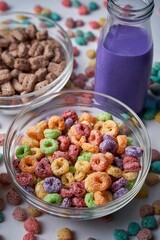 Vertical shot of a brightly colored assortment of breakfast cereals in a glass bowl