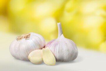 Garlic bulb with cloves on background. Food concept