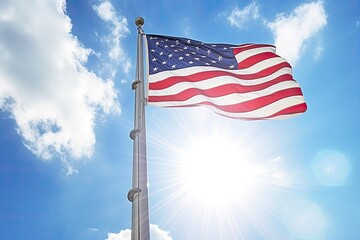 Fototapeta premium The symbol of democracy, the American flag developing in the wind against the background of the sky and the rays of the sun. Generative ai.