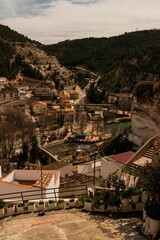 Fototapeta na wymiar Picturesque view of Alcala del Jucar village in Spain bathed in a natural warm light