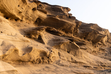 The Natural Art of the Desert: A Rock Wall Carved by the Wind