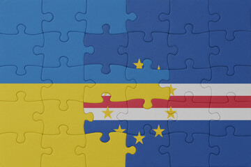 puzzle with the national flag of ukraine and cape verde . macro.concept.