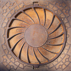 Manhole cover. Metal plate in the city