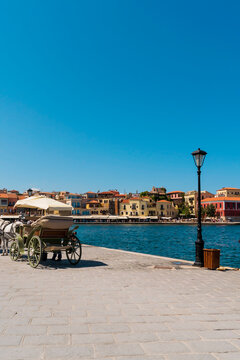 Vintage carriage on the embankment in greece crete
