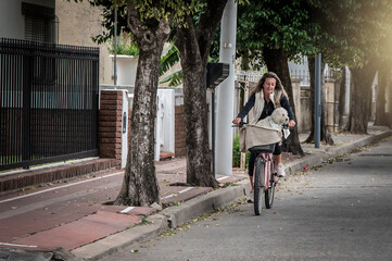 "Cycling Through the City with Our Furry Best Friend By Our Side"