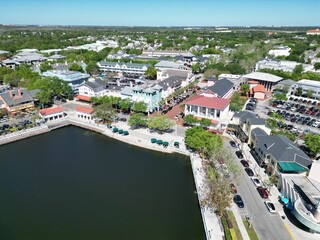 the aerial view of downtown, with the river in the foreground and buildings