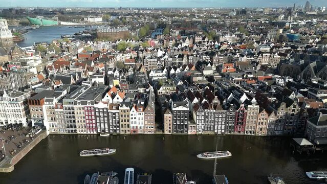Aerial view of "Dancing houses" on Damrak canal in Amsterdam, Netherlands