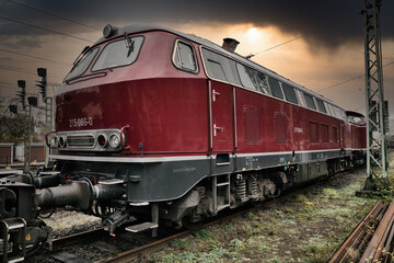 Obraz premium Alte Diesellokomotive mit Eisenbahner Nostalgie