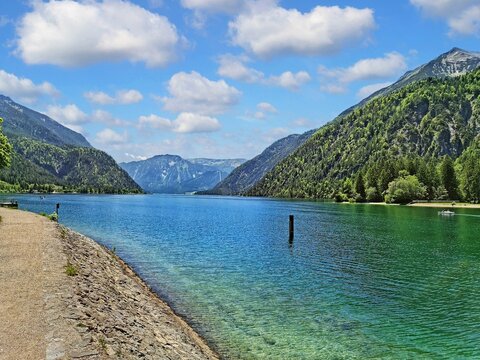 Beautiful landscape on Lake Achen (Achensee) in austrian (Tirol) alps on a summerday with blue sky, a few clouds and nature mountain view.