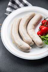 White sausage weisswurst veal, pork, lard, spices natural casing meal food snack on the table copy space food background rustic top view