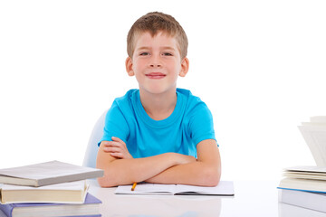 Books, learning and child portrait with a school desk for studying and classroom work. Happiness, young kid and education of a happy boy with youth isolated on a transparent, png background