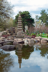 Fototapeta na wymiar Japanese styled public Kyoto park with pond in Kyiv Ukraine 