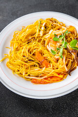 chicken noodles vegetable, meat meal food snack on the table copy space food background rustic top view