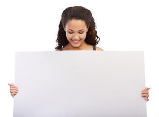 Portrait of happy woman looking at blank sign, board and promo space for info isolated on transparent, png background. Happiness, mockup and girl with paper poster in hand, presentation and smile.