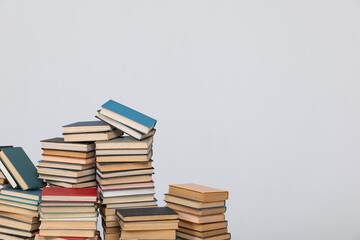 stack of books on a white background in the learning library