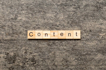 Content word written on wood block. Content text on cement table for your desing, concept