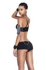 Fototapeta premium Fitness, music and portrait of woman from back with phone, earphones and workout podcast app in gym. Health, exercise and body of sports model with smartphone isolated on transparent png background.