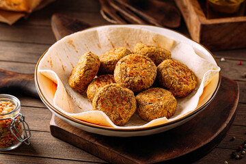 Portion of fresh vegetarian falafels with pita bread