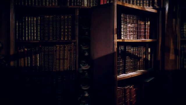Creepy Eyes Lurking Secret Library Door Zoom In. Spooky ghostly eyeballs lurking behind a secret library door, zoom in.