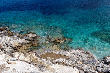 Background. Texture of the water surface and cliffs