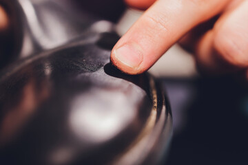 Brushes, wax, boots. applying cream with your finger. Shoe repair.