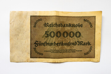 Fünfhunderttausend Mark (five hundred thousand Mark) banknote from the hyperinflation in May 1923. Antique money from the biggest devaluation of cash in the German history. Reichsbank currency. - obrazy, fototapety, plakaty
