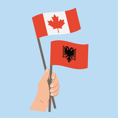 Flags of Canada and Albania, Hand Holding flags