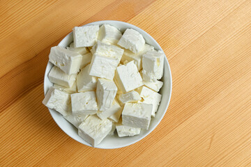 top view of feta cheese cubes in bowl
