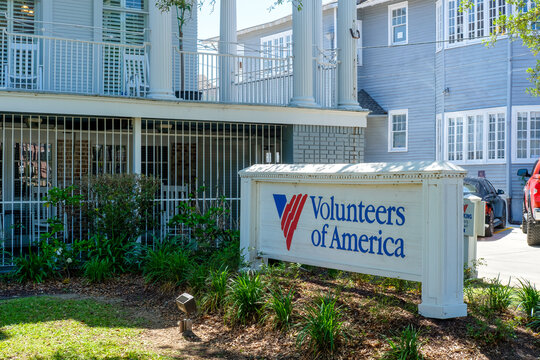 Sign and Front Section of Volunteers of America Building on Canal Street on April 17, 2023 in New Orleans, LA, USA