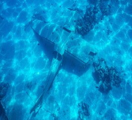 French Polynesia, Tahiti. Old plane wreck on ocean bottom.