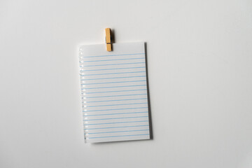 Blank note page paper with blue lines on white background. Copy space.